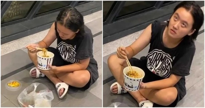 Lâm Tĩnh Ân trộm đồ ăn shipper gửi cho người trong chung cư. Ảnh: Ct Want