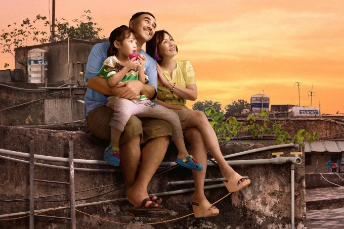 Quyền Linh, Hồng Đào trên poster phim. Ảnh: Đoàn phim cung cấp