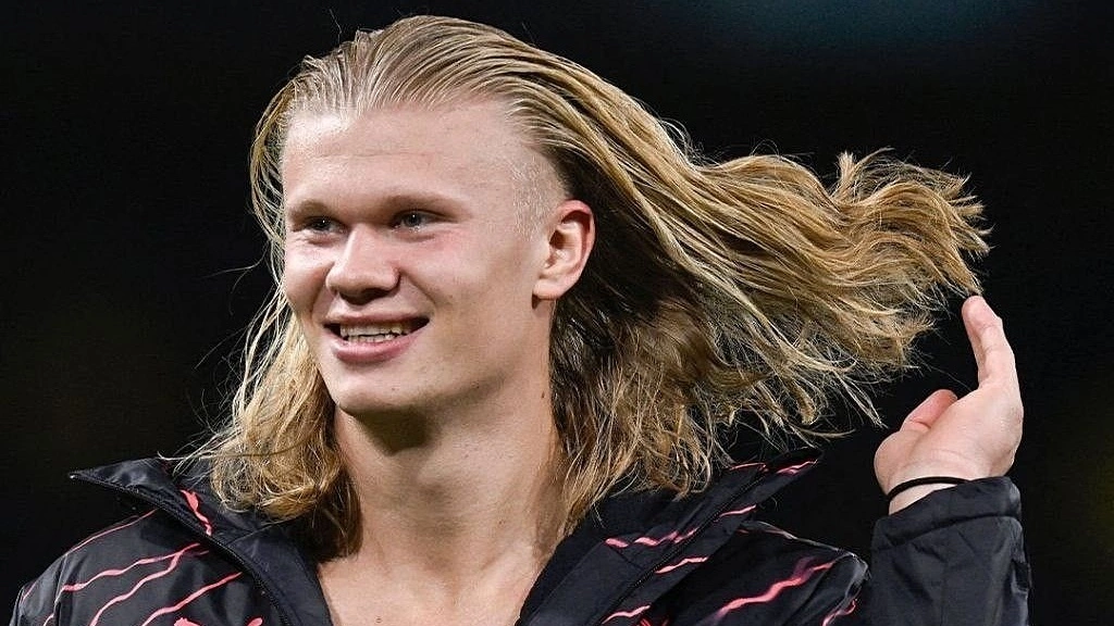 Phía sau mái tóc gây sốt của Erling Haaland